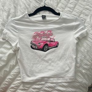 White shirt with pink design